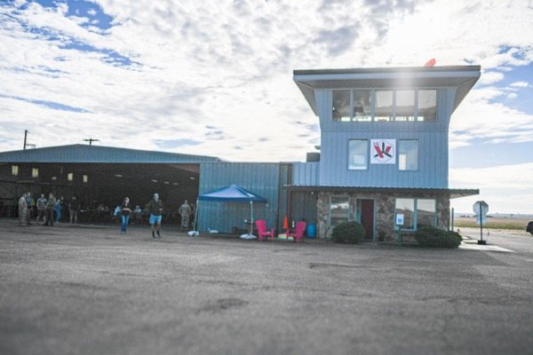 The airpark tower and community gathering on the ramp