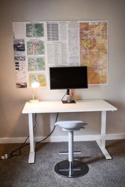 Dedicated desk and monitor in the bedroom