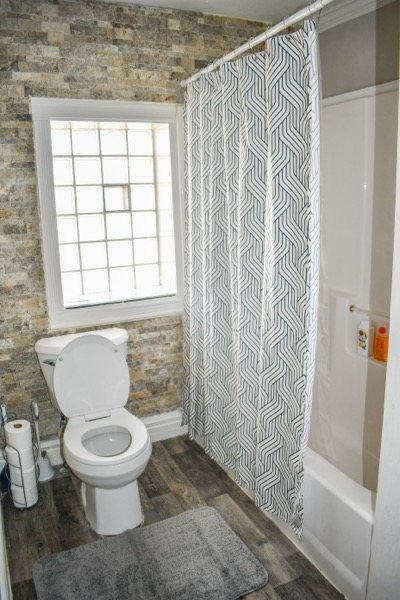 Bathroom with a walk-in tiled shower