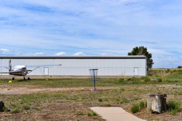 Aircraft hangar viewed from the house