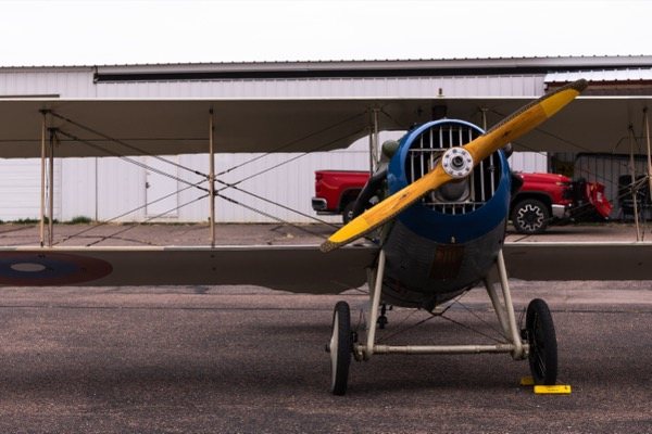 Vintage biplane parked on the ramp at 18V