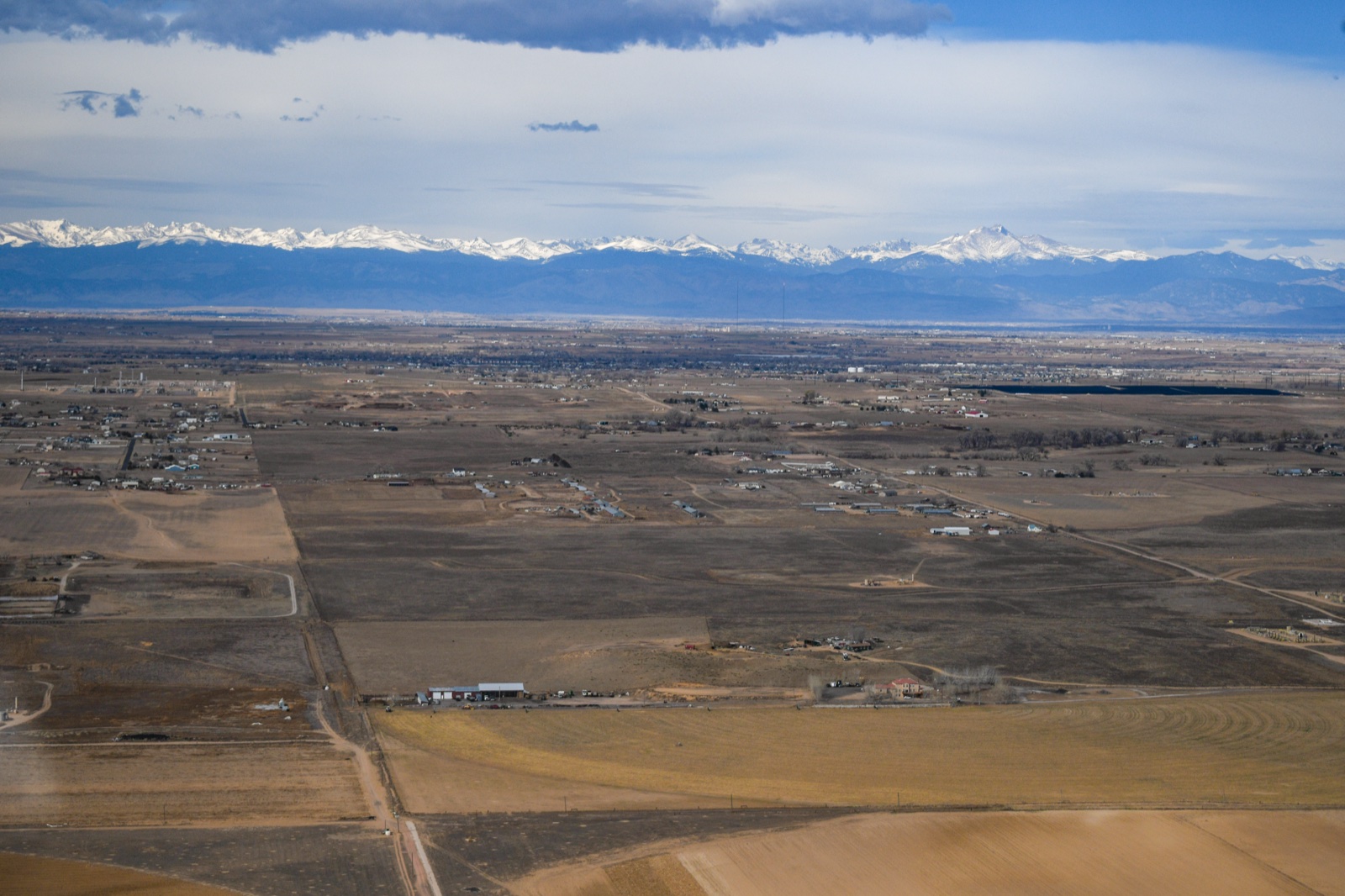 Hangars and Colorado sky at 18V