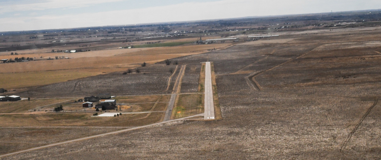 Aircraft departing 18V with mountain views